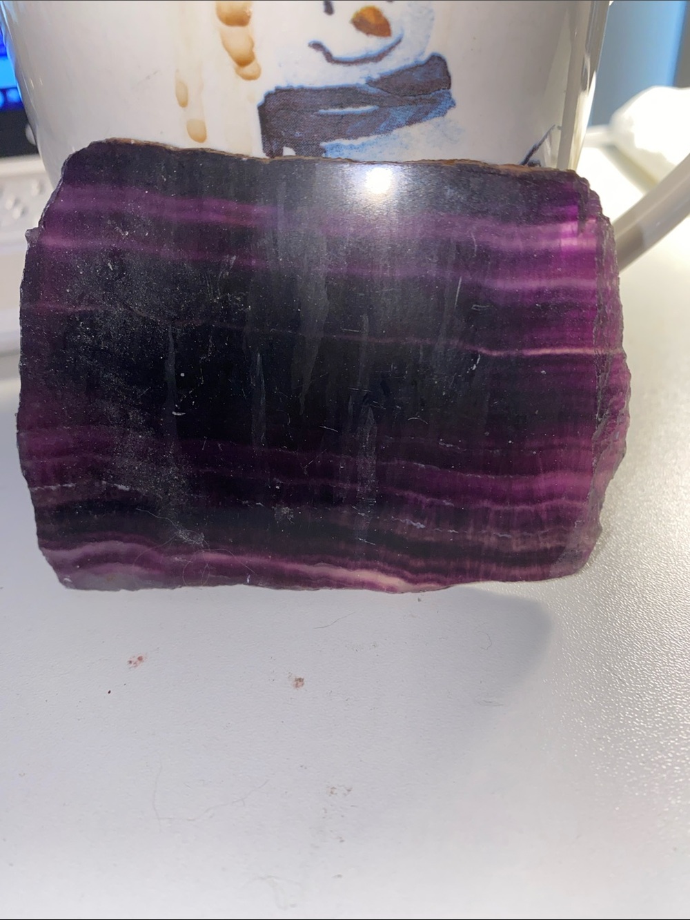 polished slab of rainbow fluorite (or purple fluorite